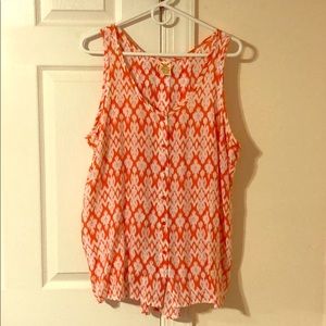 Orange and white sleeveless blouse